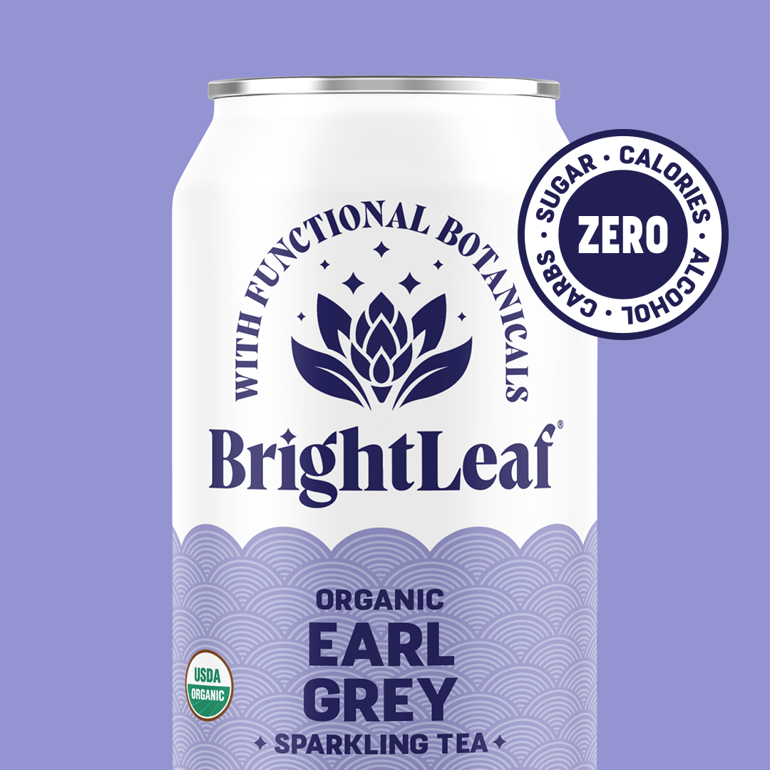 BrightLeaf Organic Earl Grey Sparkling Tea can on a purple background